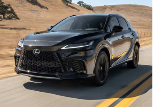 Lexus RX luxury SUV driving on a scenic highway.