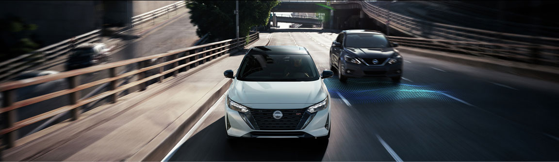 Nissan Sentra driving with driver assistance and safety technology in traffic