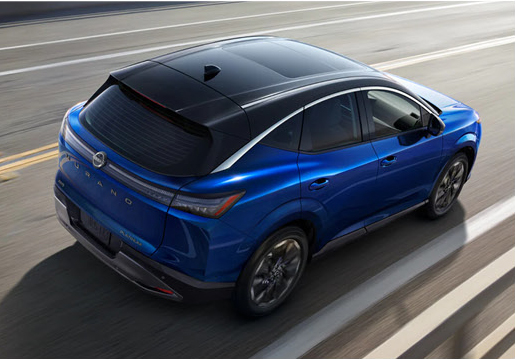 Blue Nissan Murano SUV driving on the highway
