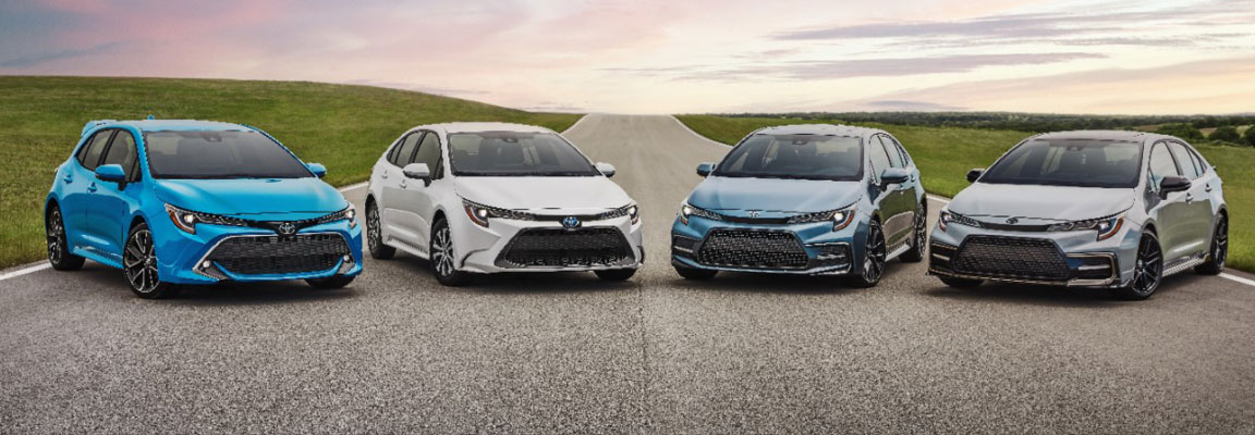 Toyota Corolla lineup parked together on an open road