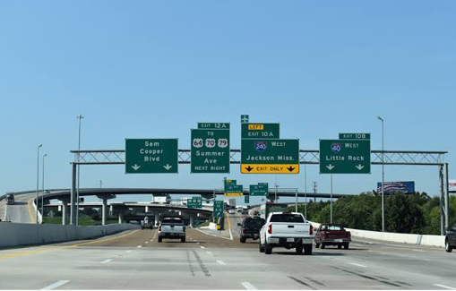 Highway directional signs for Memphis, Sam Cooper Boulevard, I-40 West, I-240 and Jackson, Mississippi.