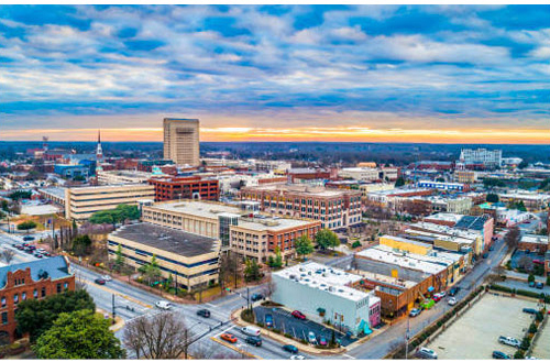 Aerial view of downtown city skyline at dusk