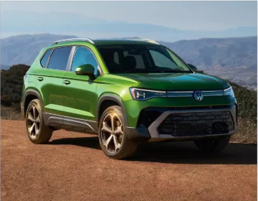 Green Volkswagen Taos shown from the front three-quarter view