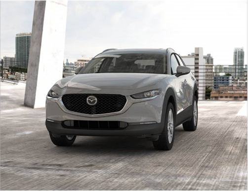 Gray Mazda CX-30 SUV in an urban setting